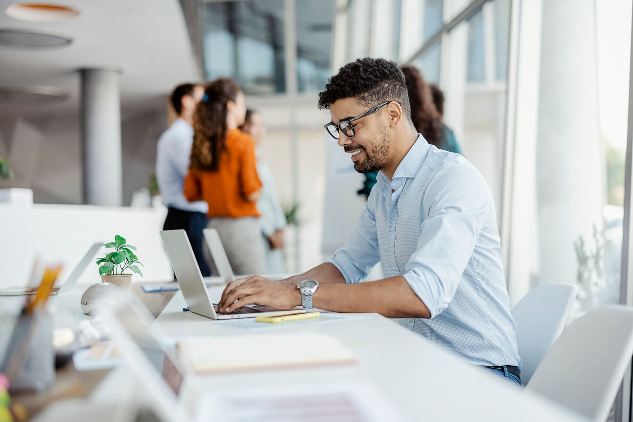 Young businessman working in office